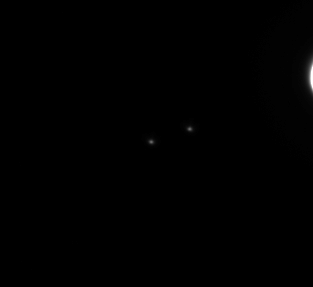 Europa (left)  eclipses Io (right): movie (11 Mar. 2015)