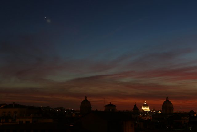 Venus and Jupiter, partly covered by a tiny cloud, are enriching the sight of the skyline in Rome: 29 June 2015