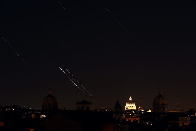 Venus, Jupiter, stars and airplanes are moving above S. Peter, Rome, from Capitoline Hill: 1 July 2015
