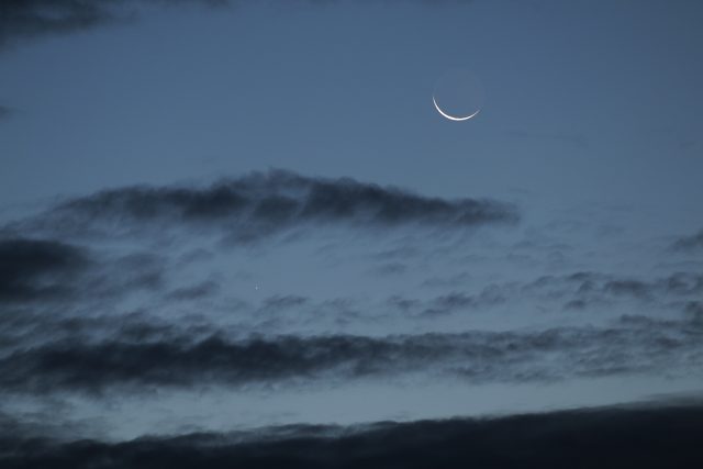 The Moon, with its sharp crescent and Earthshine, is pairing with planet Mercury