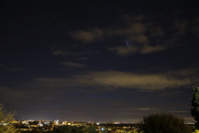 11 Oct. 2015: Venus, Jupiter and Mars show above the Roman skyline at dawn. Regulus and other stars of Leo are around them.