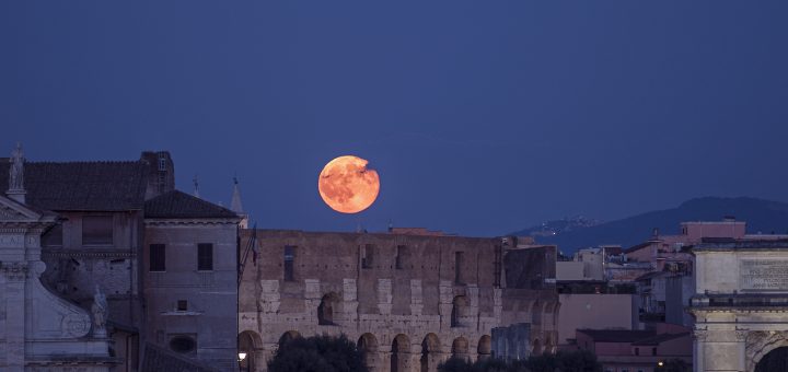 The Full Moon is rising above the Colosseum, on 20 July 2016