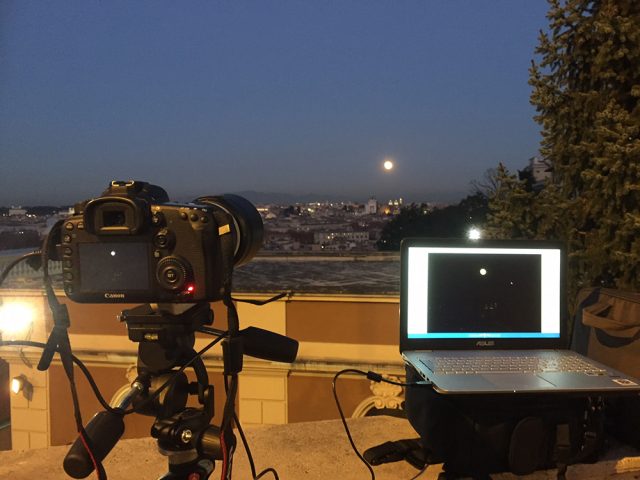 The imaging setup and the observing site, with the Moon on the distance