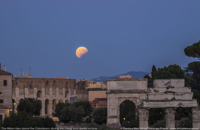 The Moon, during the partial eclipse, rises above the Colosseum. 7 Aug. 2017 - 18:30 UT