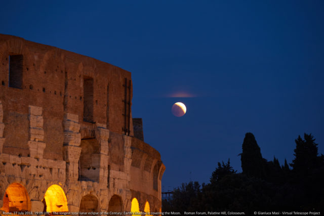 The partially eclipsed Moon opened the show, appearing beside the Colosseum.