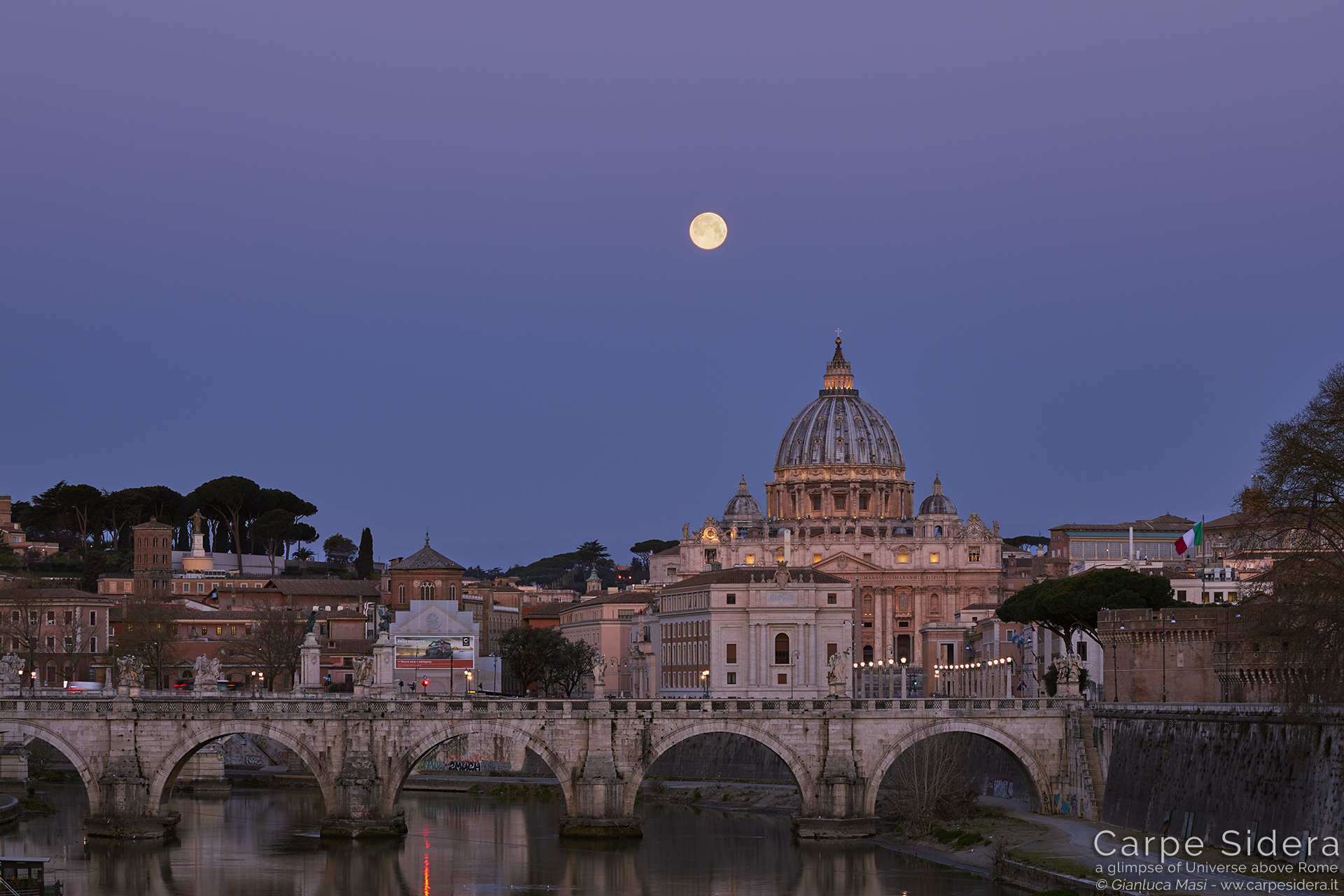 The Supermoon hangs above St. Peter's Dome in Rome, at dawn, with a bueatiful “Venus belt”, the pink horizontal band on the top - 21 Mar. 2019