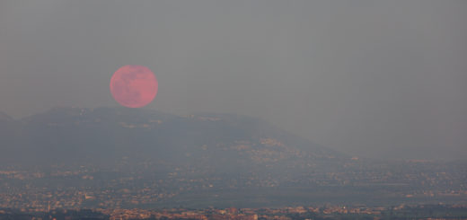 The 19 Apr. 2019 full Moon shines across the clouds.