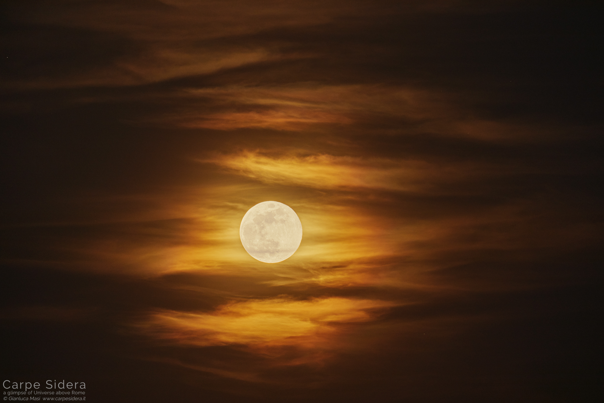 The 19 Apr. 2019 full Moon shines across the clouds.