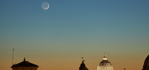 A sharp Moon crescent adds its speechless beauty above St. Peter's Dome, at sunset. The star Aldebaran is visible in the upper left corner.