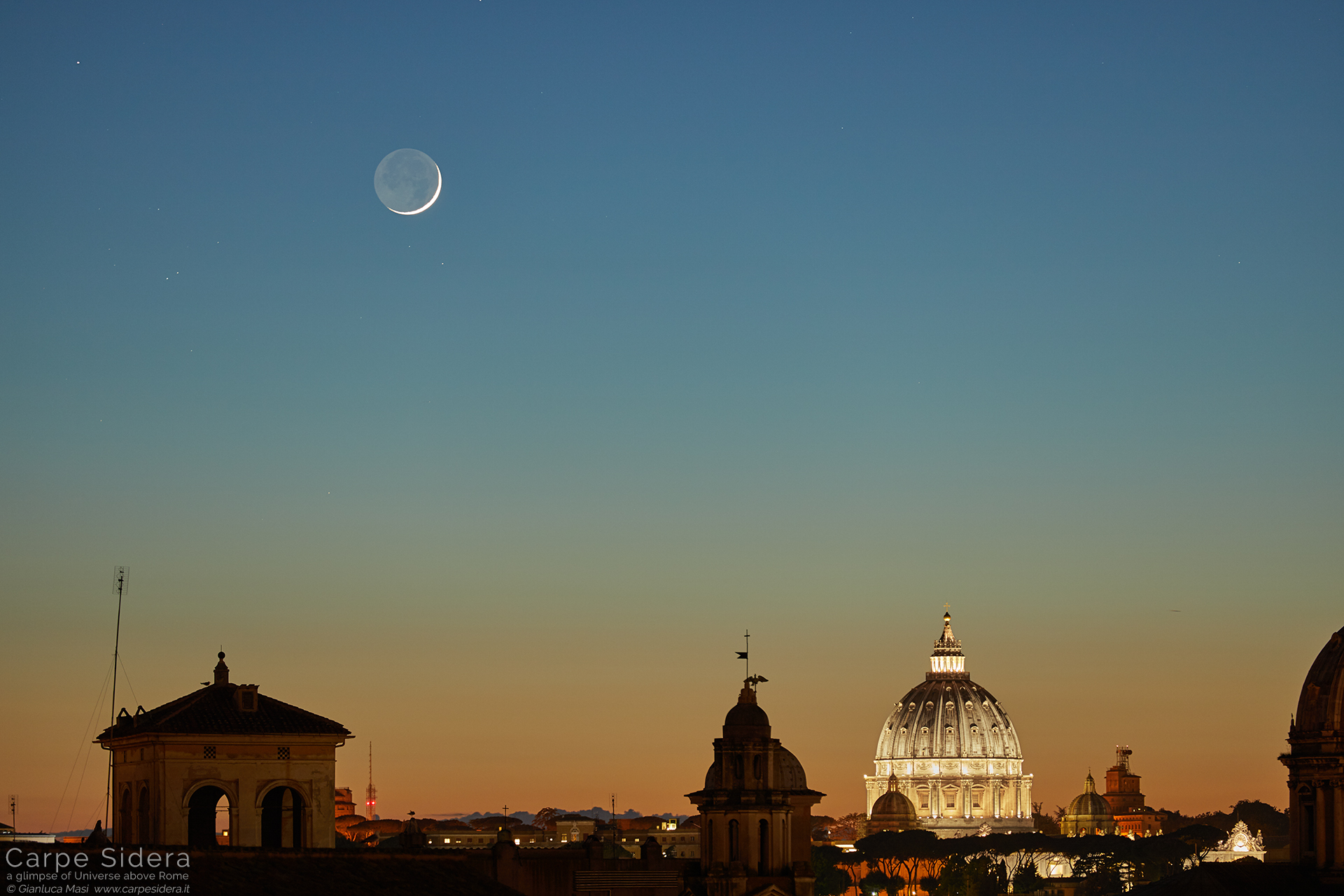 A sharp Moon crescent adds its speechless beauty above St. Peter's Dome, at sunset. The star Aldebaran is visible in the upper left corner.