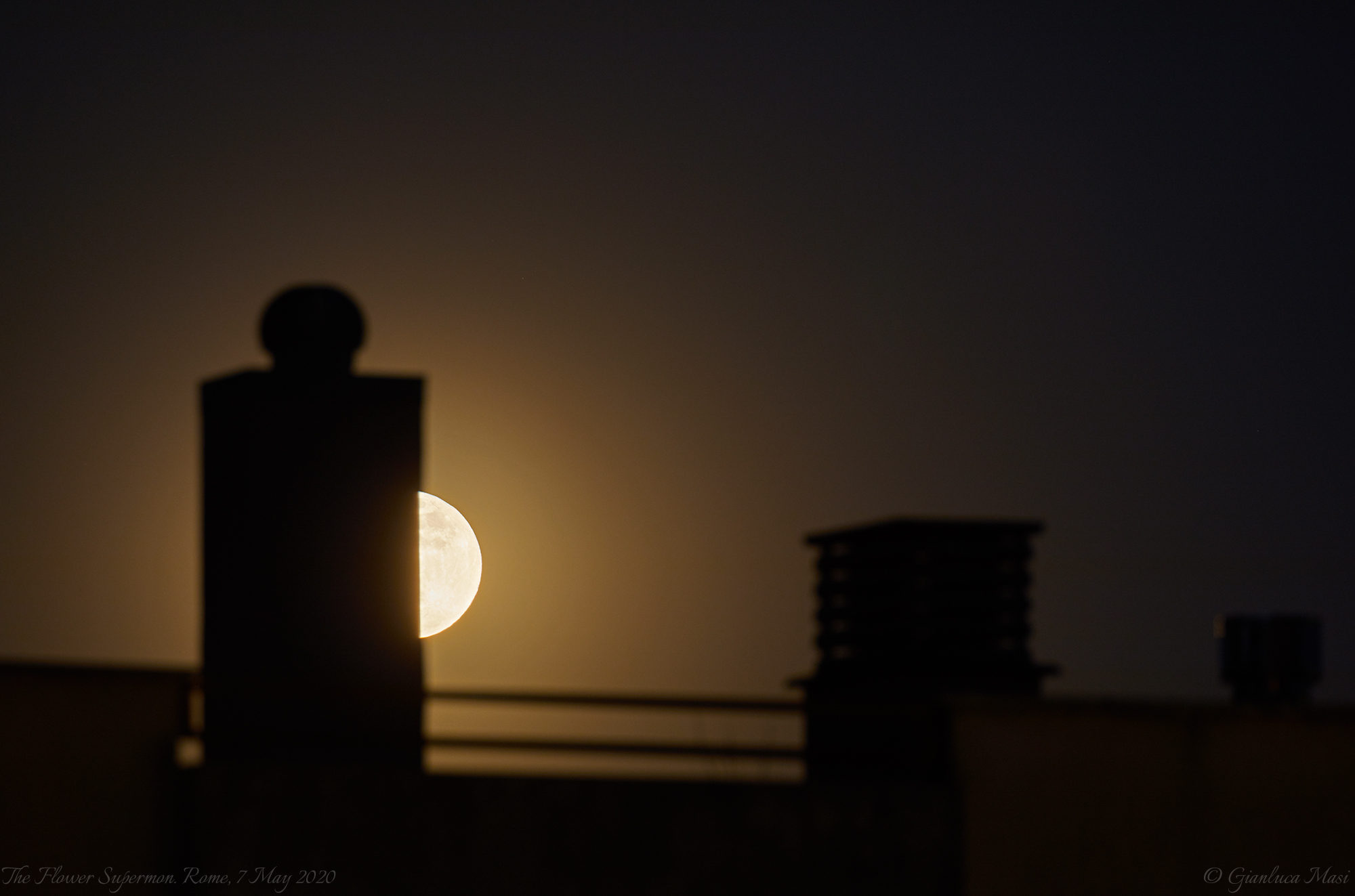 The Flower Supermoon was playing "hide and seek" among the roofs of Rome - 7 May 2020.