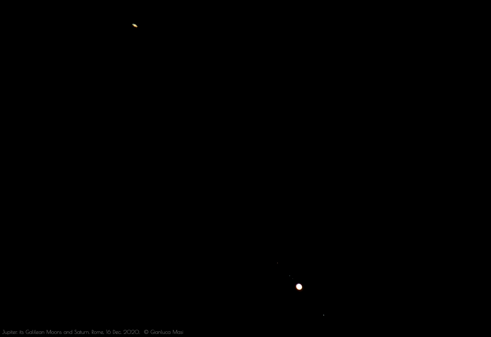 Jupiter shows its principal, four satellites in this image, while pairing with Saturn.