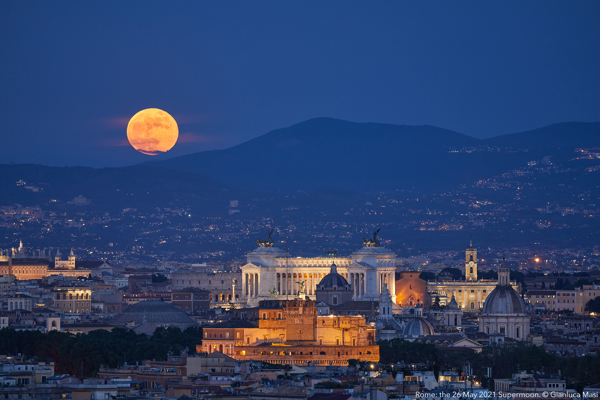 The Flower Supermoon rises above Rome. 26 May 2021.