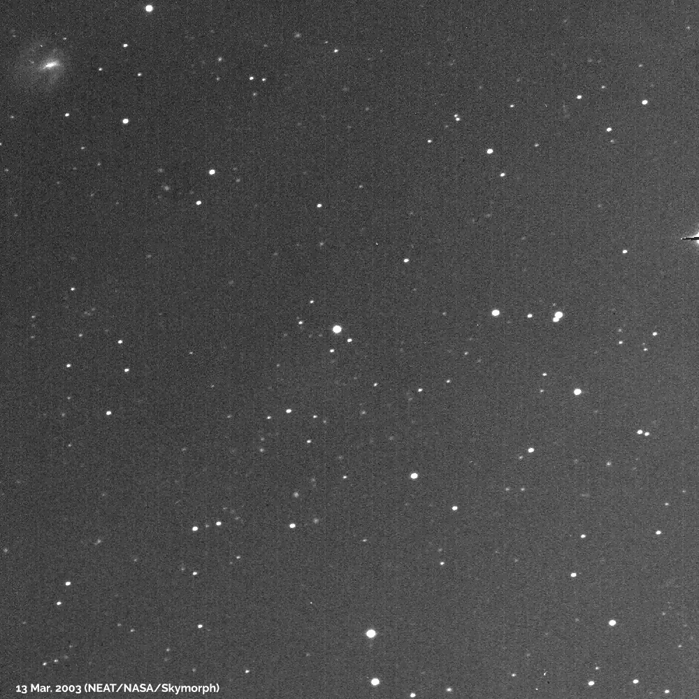 L’asteroide (65487) “Divinacommedia”, in movimento tra le stelle, nei pressi del centro dell’immagine. 13 marzo 2003.