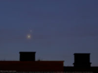 Venus and Jupiter shine together at dawn. Venus is showing a colorful corona, while Europa, Ganymede and Callisto satellites are visible around Jupiter. 1 May 2022.