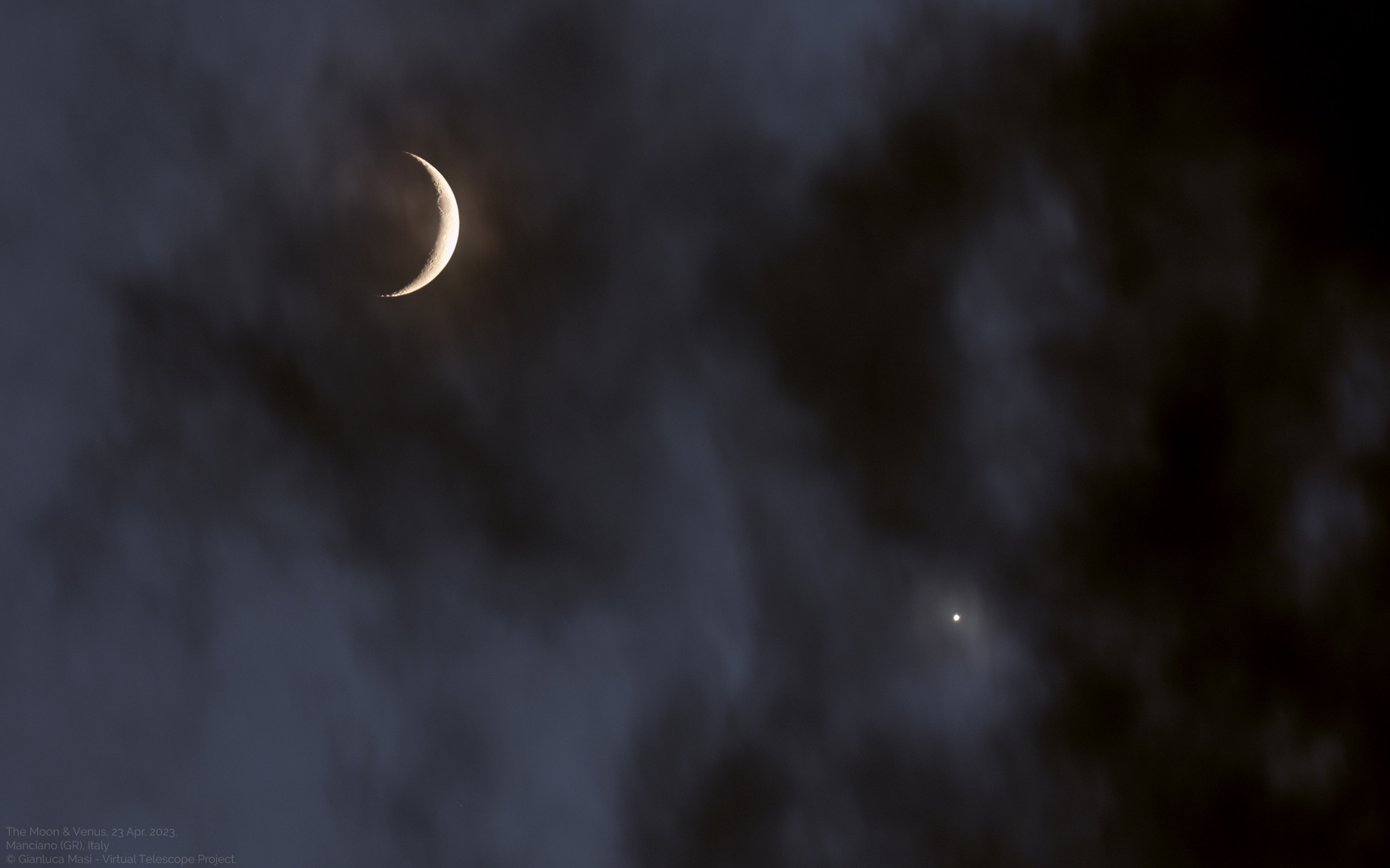 The Moon and Venus, with clouds. 23 Apr. 2023.
