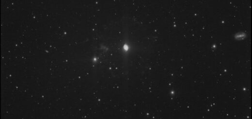 NGC 6543, the "Cat's Eye" planetary nebula, and galaxy NGC 6552.